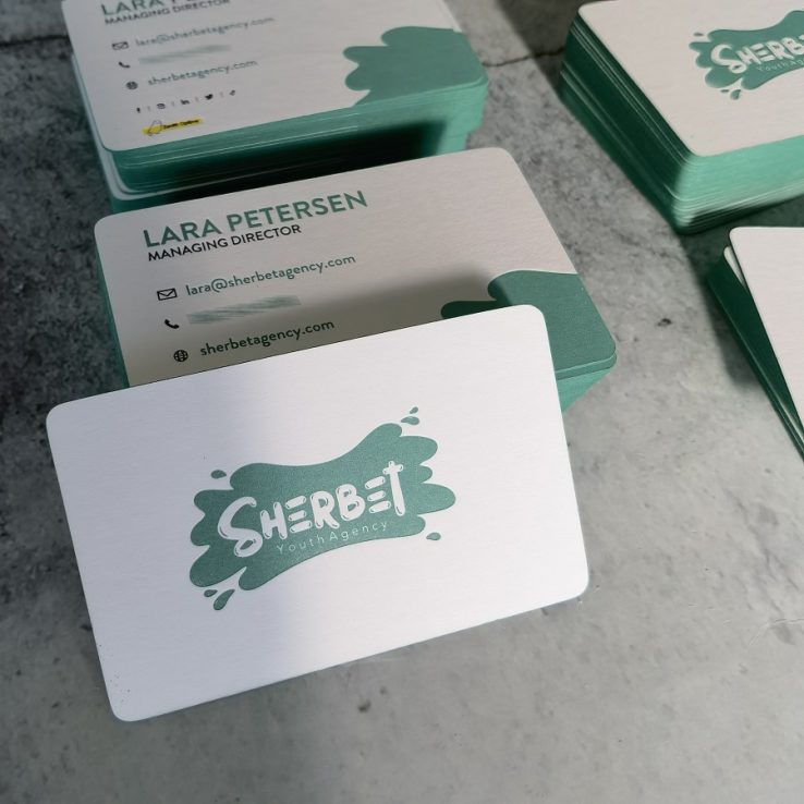 Close up of the Teal Letterpress Cards with Edge Printing