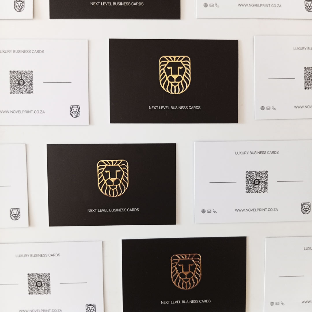 An array of Black and Gold 3D Foiled Business Cards with Novel Print South Africa details