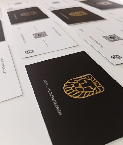 Product shot of the 3D Foiled Business Cards in gold with wording: Next Level Business Cards
