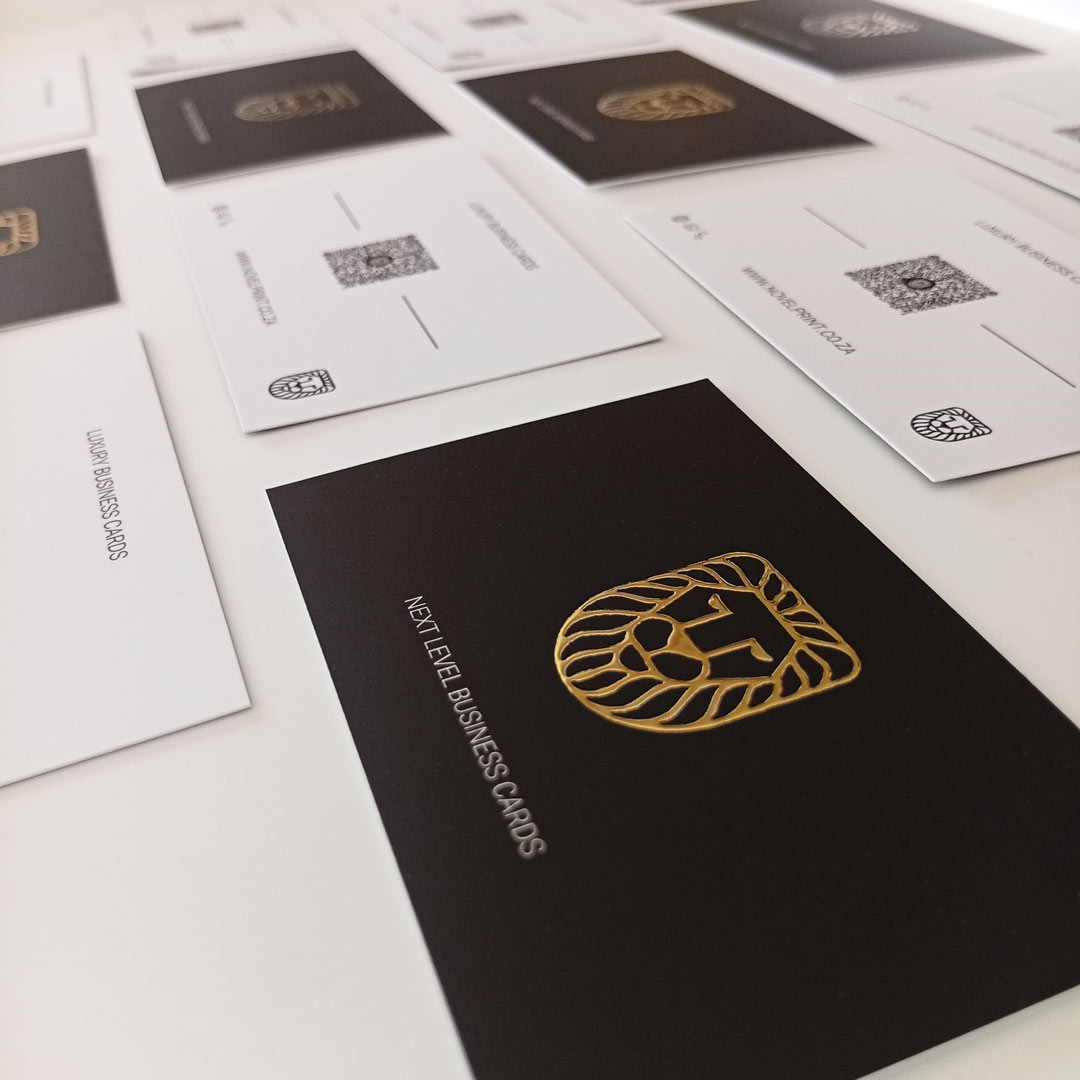 Product shot of the 3D Foiled Business Cards in gold with wording: Next Level Business Cards