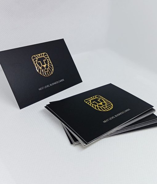 Raised Foil 3D Business Card logo in gold on black card.