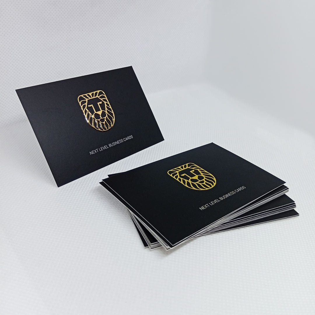 Raised Foil 3D Business Card logo in gold on black card.