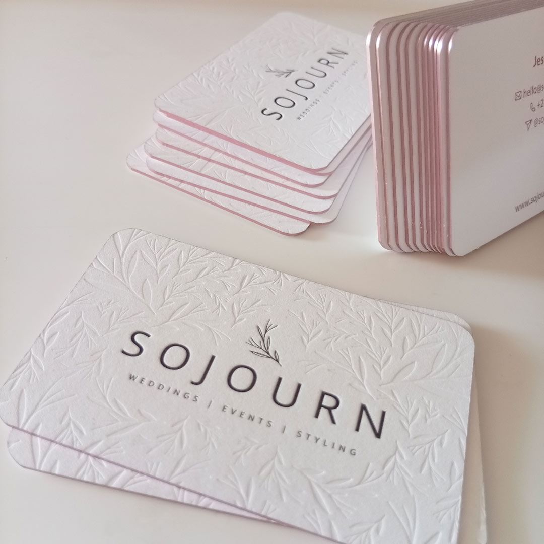Subtle shimmer of the soft pink metallic foiled edges of these luxury business cards