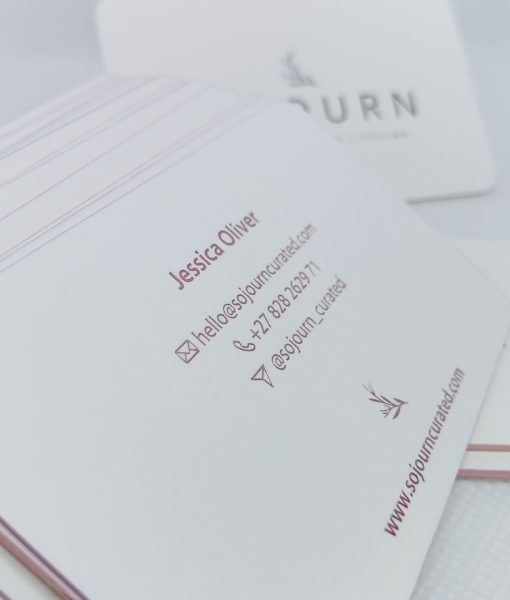 Close up of the elegant pink foil of the back contact details of these luxury business cards