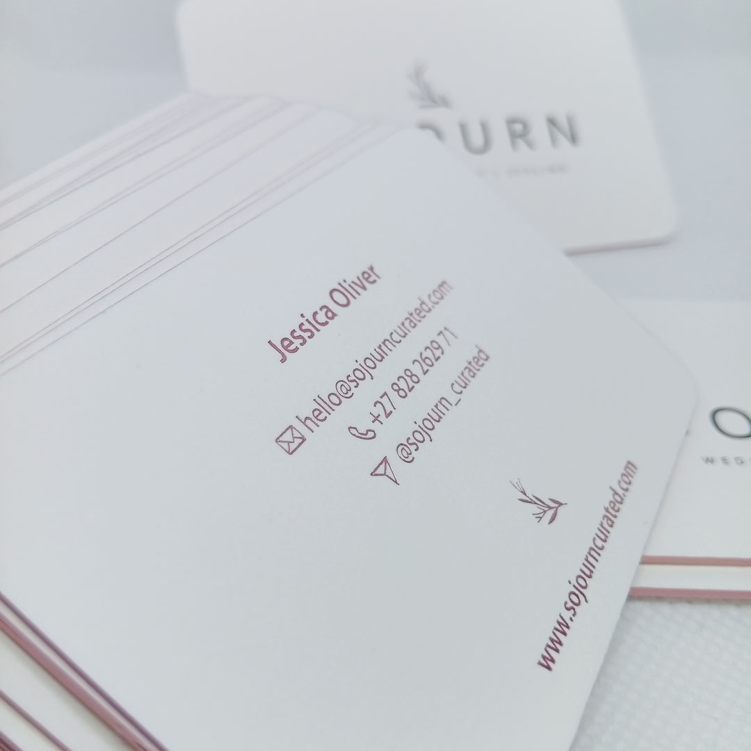 Close up of the elegant pink foil of the back contact details of these luxury business cards