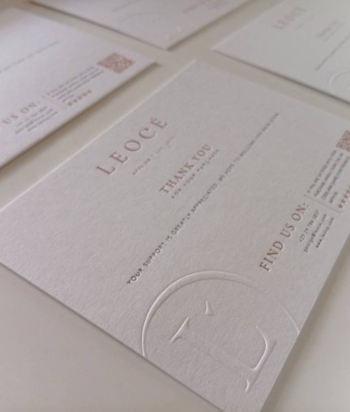 Perspective shot of a grid of 4 Debossed Letterpress Thank you Cards